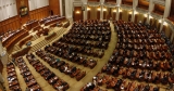 Coaliția intră cu „bocancii” în Parlament
