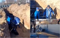  Zeci de oamenii au fost ucişi de trupele ruseşti iar cadavrele lor au fost  aruncate în gropi comune într-un oraş ucrainean